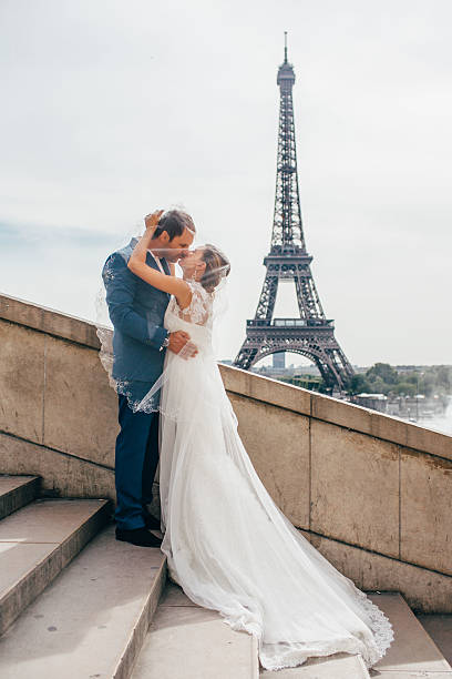 istock couple on honeymoon near Eiffel Tower in Paris 539946432