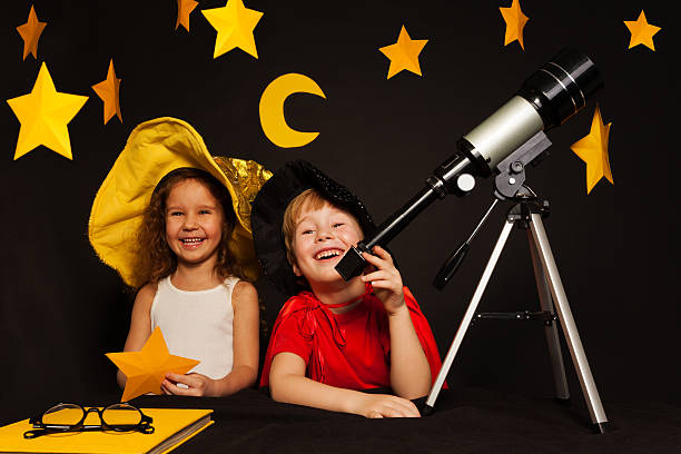 istock Happy five years old kids playing sky watchers 539946530