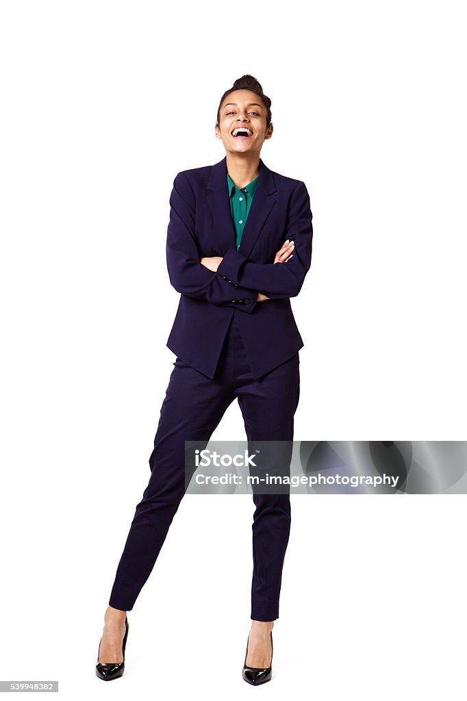Successful young female business executive Full body portrait of successful young female business executive standing on white background Women Stock Photo