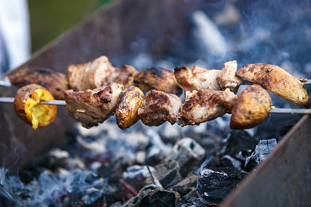 istock Grilling shashlik on barbecue grill. Selective focus 539949292