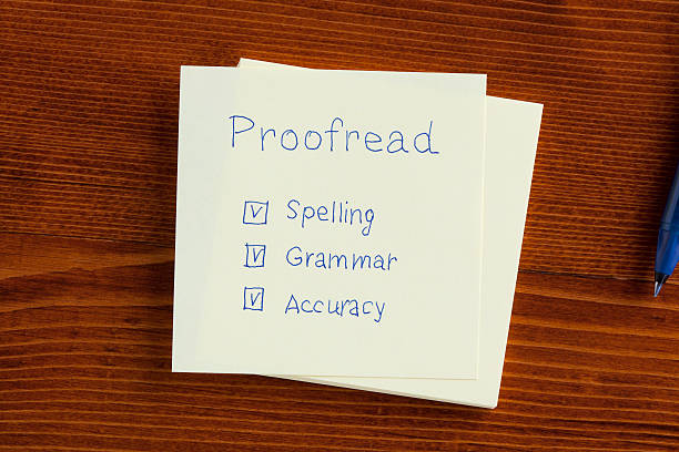 Proofread written on a note Proofread note with check boxes for spelling, grammar and accuracy. proof reading documents stock pictures, royalty-free photos & images