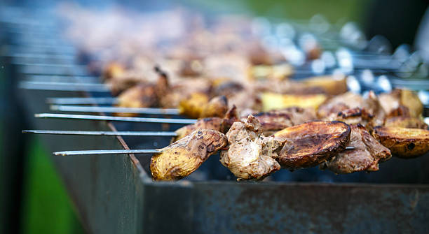 istock Grilling shashlik on barbecue grill. Selective focus 539950028