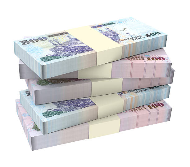 istock Saudi Arabia rials bills isolated on white background. 539951758