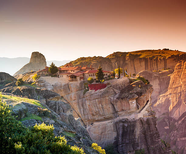 A look at the Kalambaka scenery, also called Kalabaka, where the Meteoras are in the Thessaly Plain in Greece. The monasteries were built on sandstone rock pillars.
