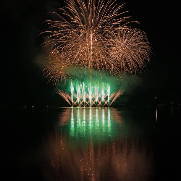 istock Colorful fireworks with reflection on lake. 539952670