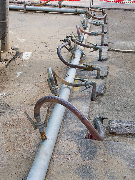 istock temporary metal pipes cross the road 539954398