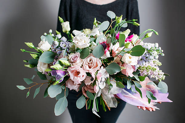 istock Rich bunch of flowers, green leaf in hand Fresh spring 539955922