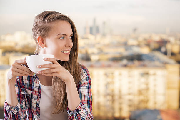 istock Pretty woman drinking coffee 539956590