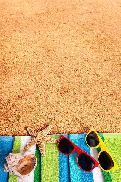 istock Caribbean summer beach background sunglasses copy space vertical 539957240