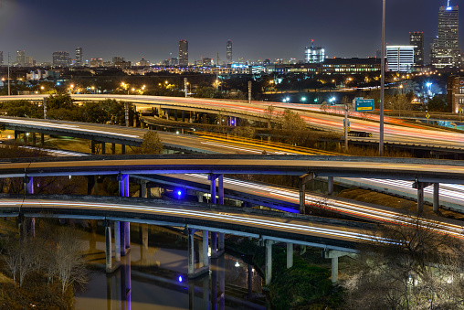 View of i-45 Interstate Freeway at night and flyovers around Buffalo Bayou. Near Sabine Promenade.
