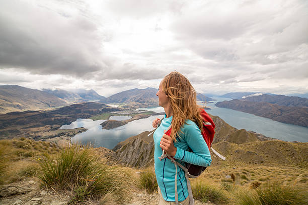 istock Hiker enjoys view at mountain top 539961244