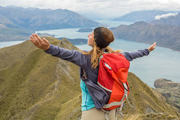 istock Arms outstretched on mountain top 539962322