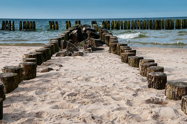 istock Beautiful beach, sea and breakwater 539964294