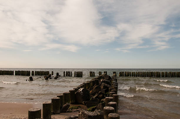 istock Beautiful beach, sea and breakwater 539964878