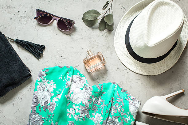 istock feminine summer look: dress, sunglasses, hat and shoes 539965704