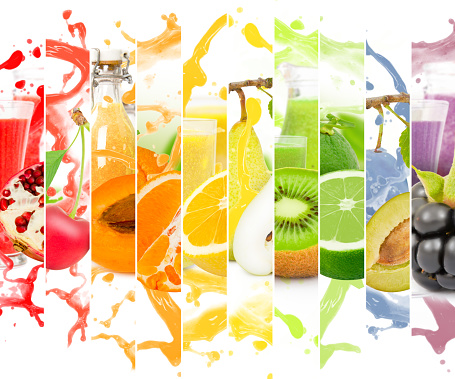 Rainbow colorful fruit stripe collection with splash and glass with drink on white background