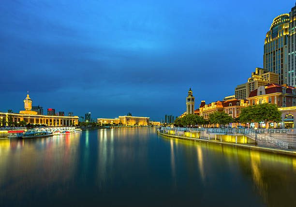 istock nightview of tianjin downtown district,china. 539970618