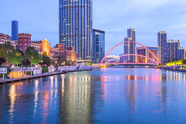 istock nightview of tianjin downtown district,china. 539970942