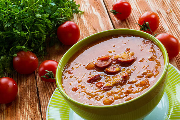 istock Tomato soup with smoked sausage, tomatoes and lentil 539974010