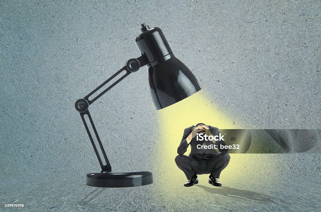 Businessman and spotlight Adult Stock Photo