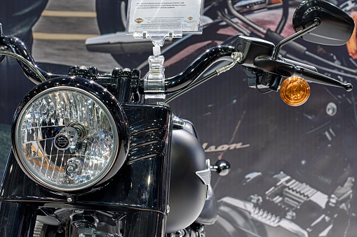 Brno,Czech Republic - March 4,2016: Close up of front  light of motorcycle Harley Davidson Softail Fat Boy Special  on International Fair for Motorcycles on March 4,2016 in Brno in Czech Republic