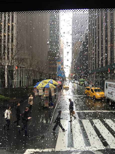 istock Rainy day downtown looking through window glass 539975884