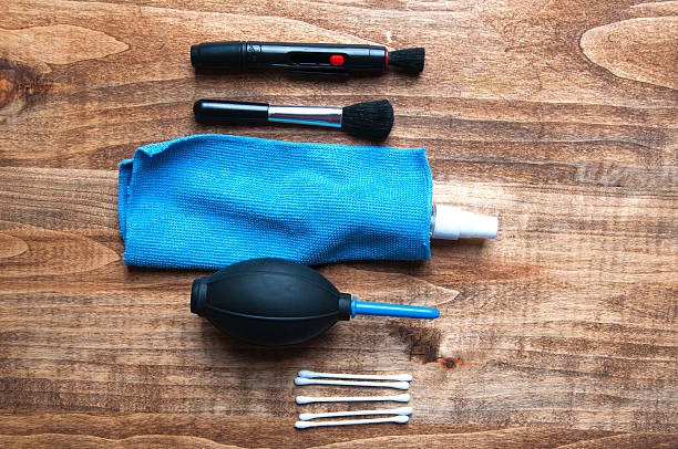 istock Equipment for cleaning camera on a wooden background from above 539980052