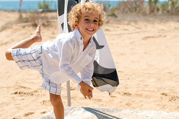 istock Happy Boy Plays Flying Airplane 539980186