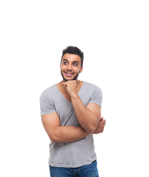 istock Casual Handsome Man Hold Chin Look Up Smiling 539980654