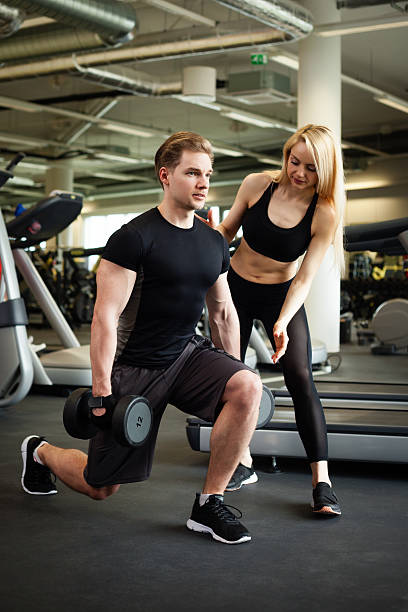 istock Fitness couple in gym 539981840