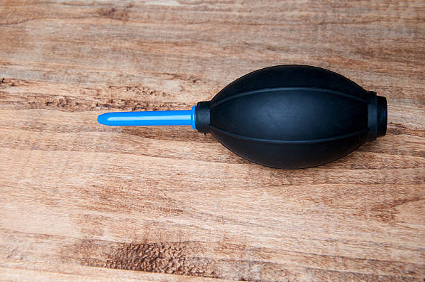 istock Equipment for cleaning lens digital camera. wooden background. 539982808