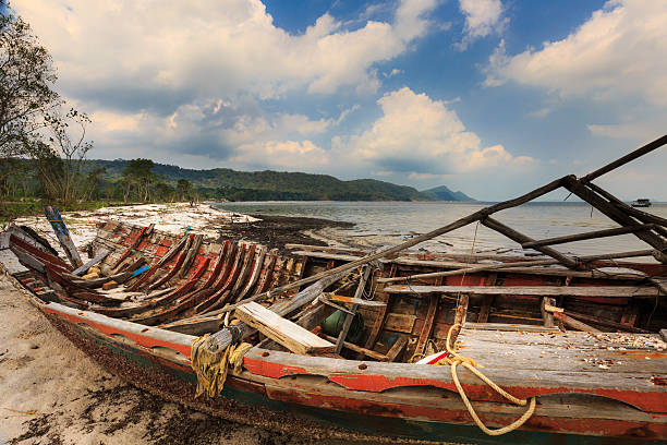 istock abandoned old boat view beside the beach 539986458