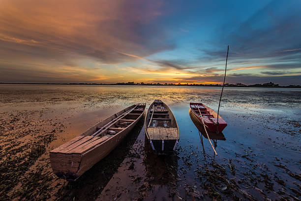 Boat on shallow water, stock photo