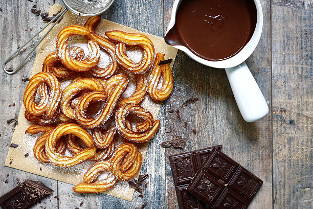 istock Traditional mexican dessert churros with chocolate sause. 539987914