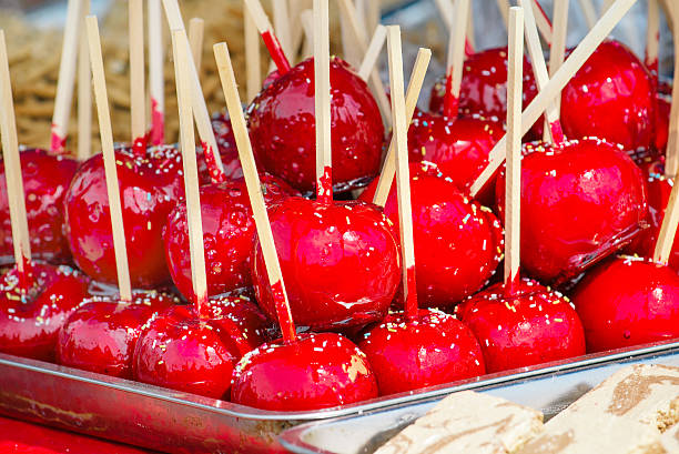 istock Sweet glazed red toffee candy apples on sticks 539988770