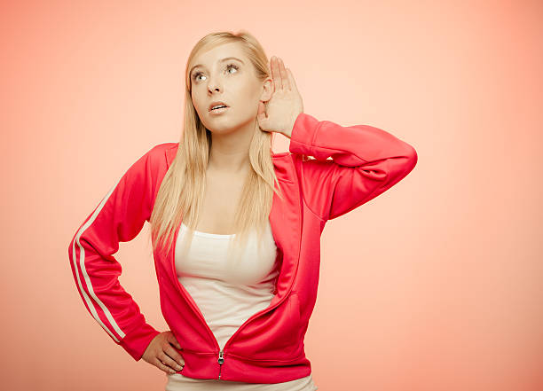 istock Female hand to ear listening 539990818