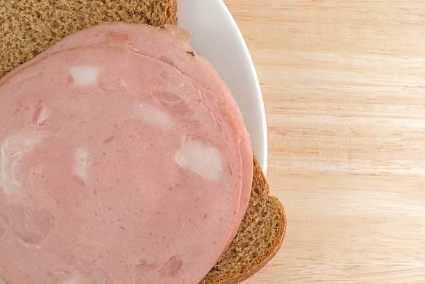 istock Mortadella sandwich on wheat bread top close view 540091318