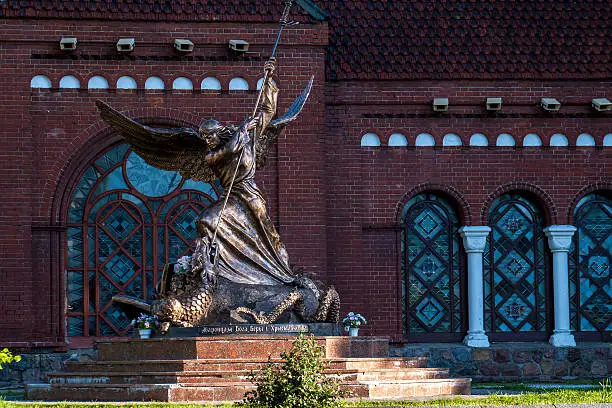 Statue of Saint George the dragon-slayer - patron Saint of Minsk- located in front of the Chirch of Saints Simon and Helena. The chirch is a religious centre of Belarussian Greek Catholoc Chirch, as well as center of cultural and socila life in Minsk.  Chirch of Saints Simon and Helena was designed by Polish architects Tomasz Pajzderski and Władysław Marconi.
