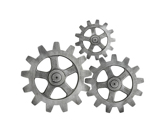 Metal Cog on White Background Metal Cog on White Background gear mechanism photos stock pictures, royalty-free photos & images