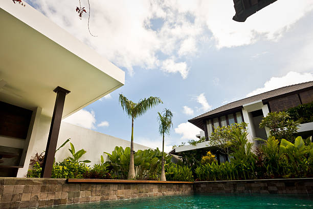 istock Swimming pool closeup with a luxury hotel view 540095354
