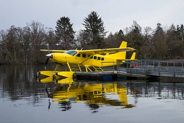 DeHavilland Canada DHC-2 Beaver Floatplane, taxiing to dock at the Seattle Lake Union Seaplane Base, Seattle, WA.  July 2016.