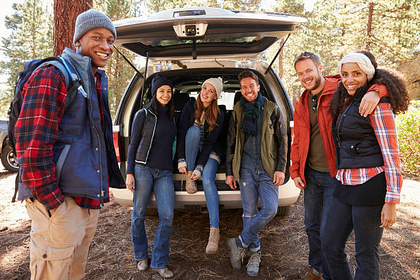 istock Friends at the open back of car before a hike look 540096172