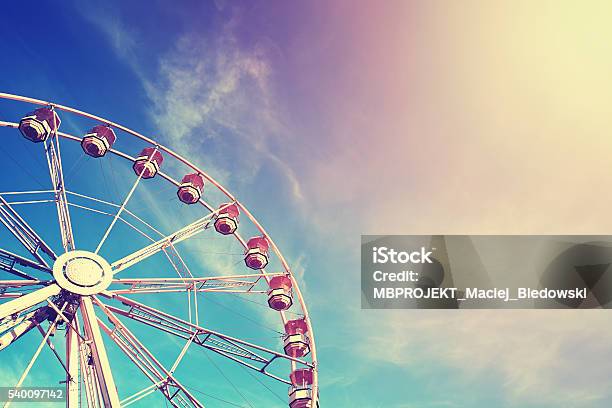 Vintage Stylized Ferris Wheel At Sunset Stock Photo - Download Image Now - Amusement Park, Retro Style, Ferris Wheel