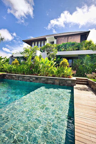 istock Modern swimming pool  with plants in a modern hotel garden 540099220