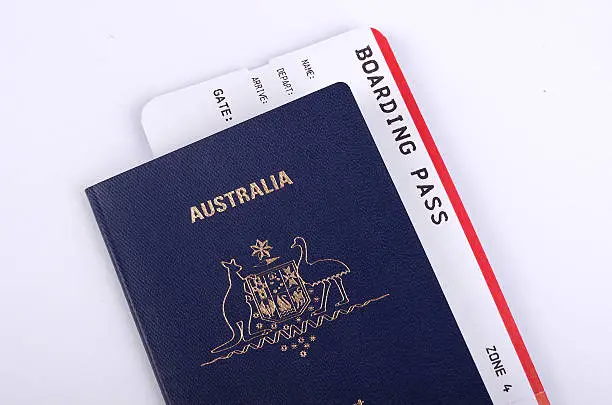One new Australian passport with an international boarding pass inserted inside the document.
