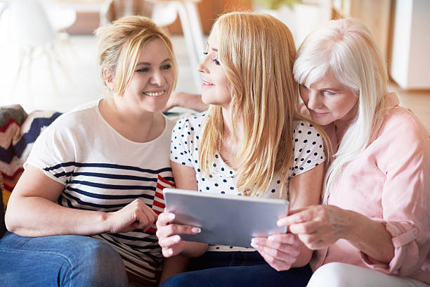 istock Digital tablet used by mature friends 540102062