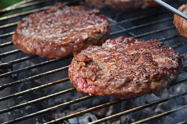 istock Meat burgers for hamburger grilled on grill 540102866