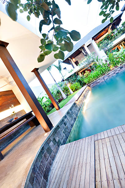 istock Modern swimming pool and sidewalk around in a luxury house 540103988