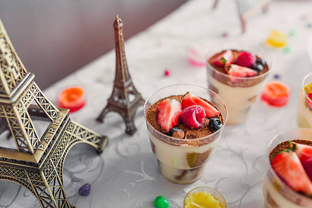 Dessert with berries in glasses on the festive table