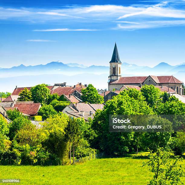 Old French Village In Countryside With Alps Mountains In Summer Stock Photo - Download Image Now